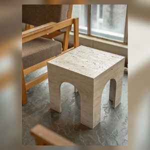 Light Arch Travertine Side Table in a landscape view