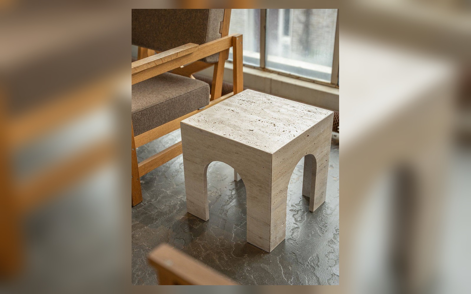 Light Arch Travertine Side Table in a landscape view